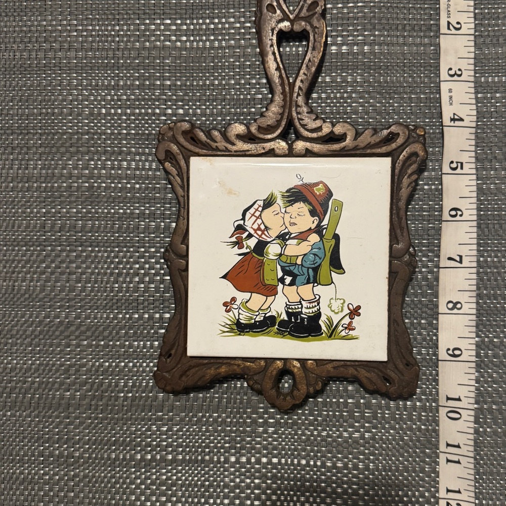 Vintage iron ceramic trivet